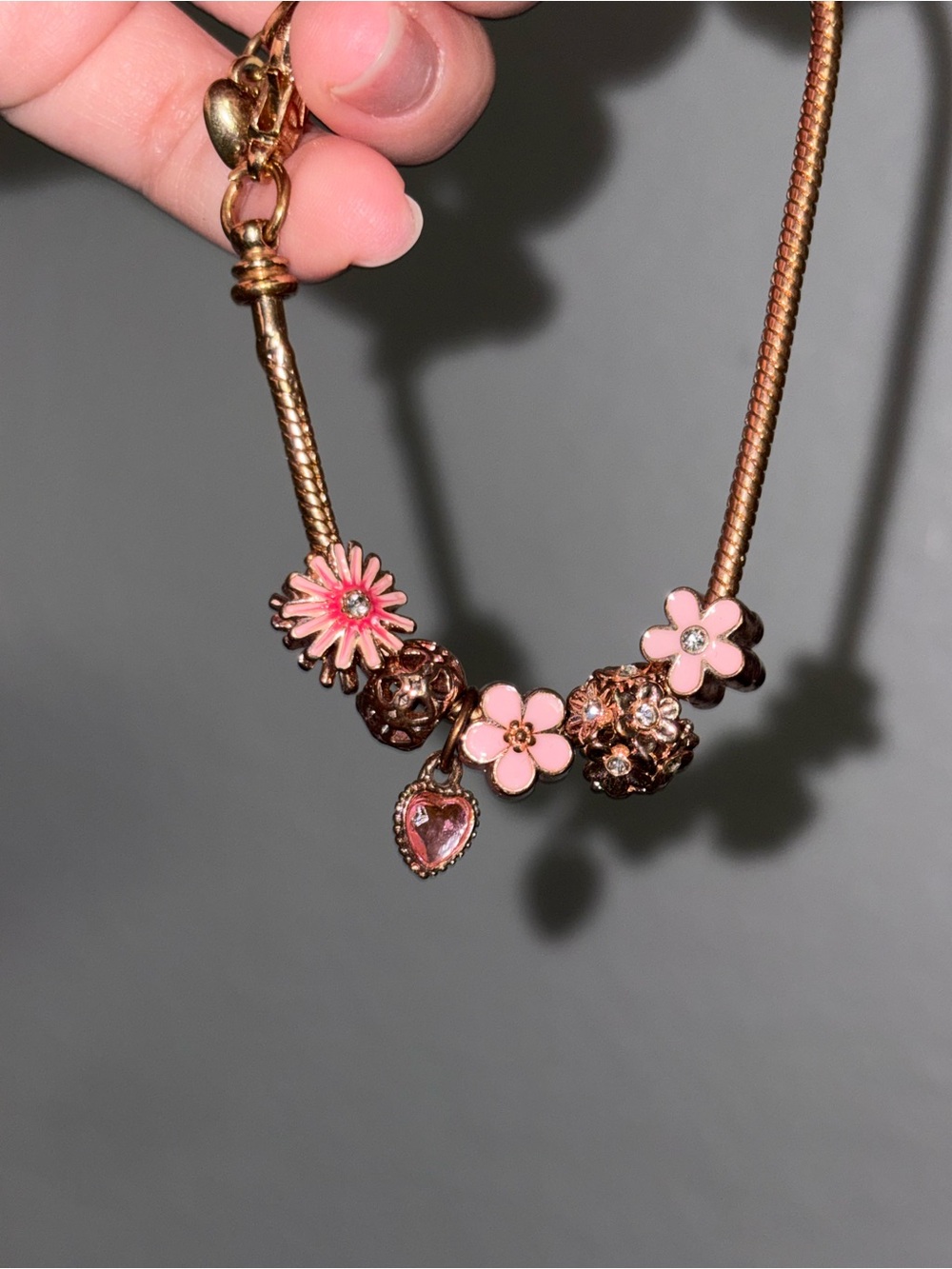 Gold-Tone Pink Flower Charm Necklace with Heart Pendant